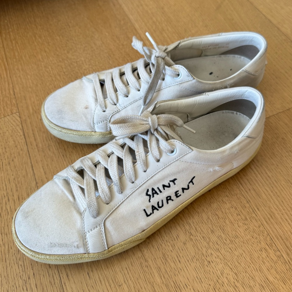 cream colored Saint Laurent low tops